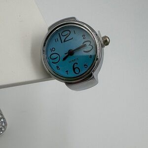 Silver and Blue Quartz Ring Watch